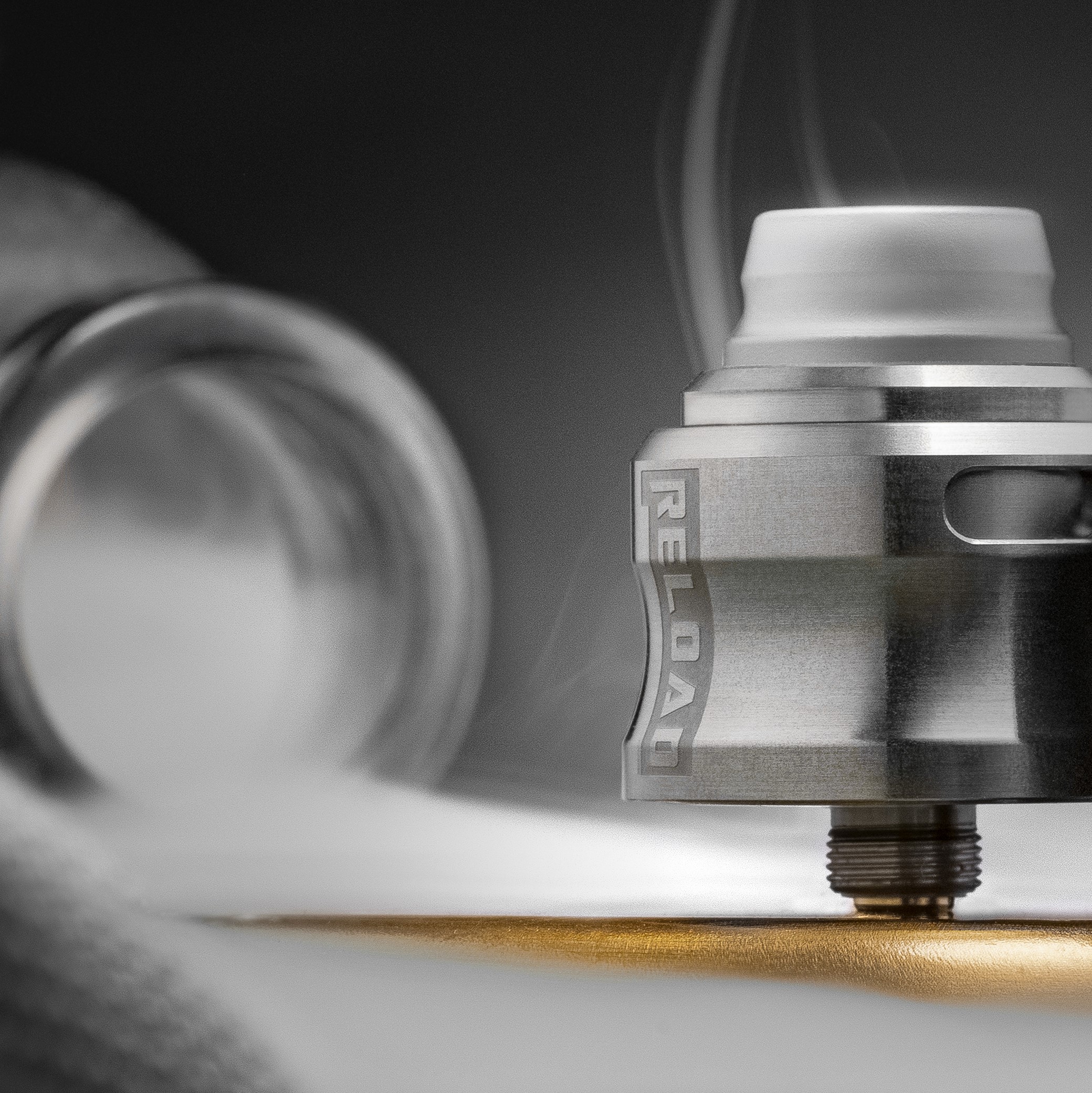 Reload S Pro RDA Dripper 25mm Top Airflow Deck Postless